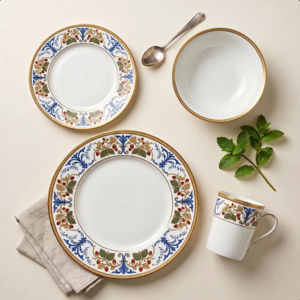 Heirloom Manor strawberry vine china flat lay with a mug, bowl and plates